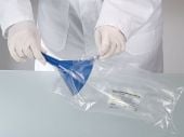 Laboratory Worker Unpacking a Burkle Polystyrene Blue Detectable Disposable Funnel