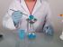 Boiling flask with blue powder transferred through a Burkle stainless steel powder funnel