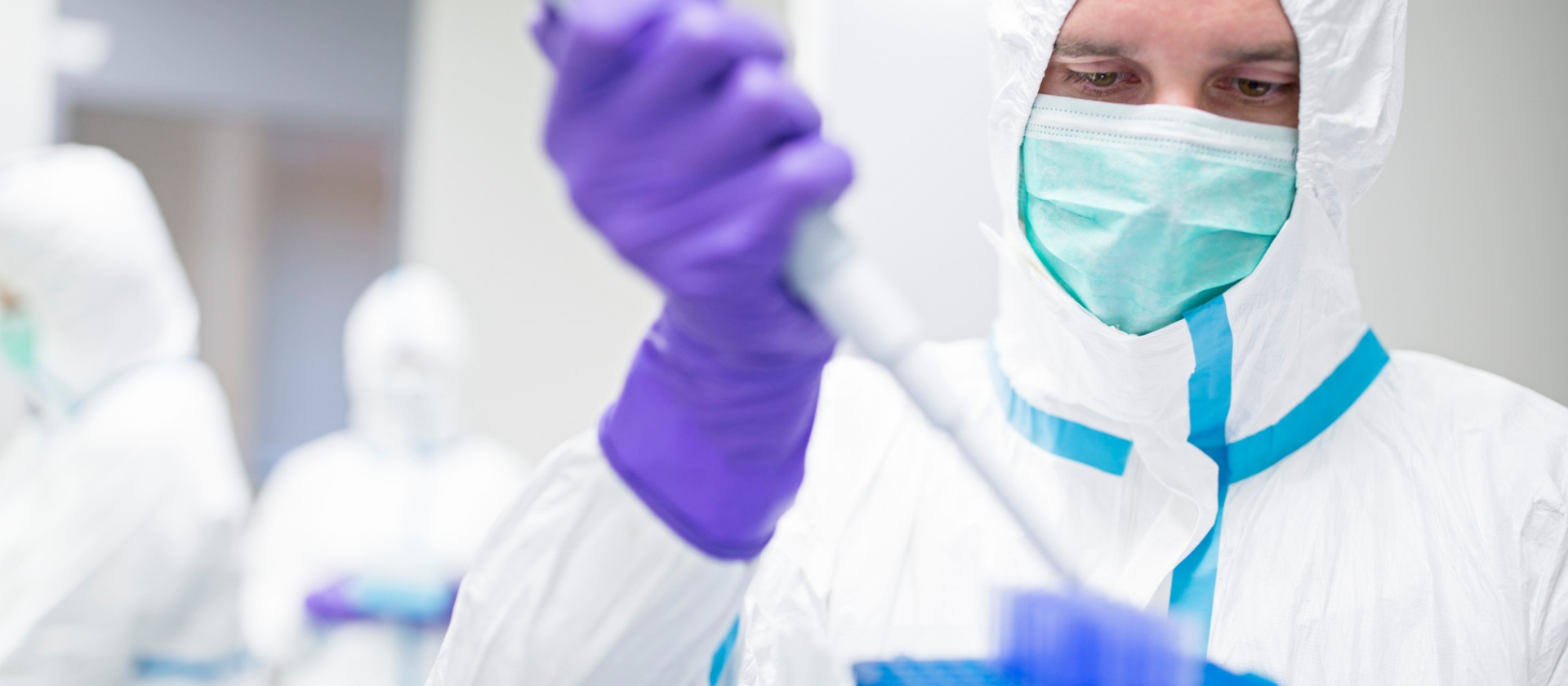 Man Pipetting in Lab