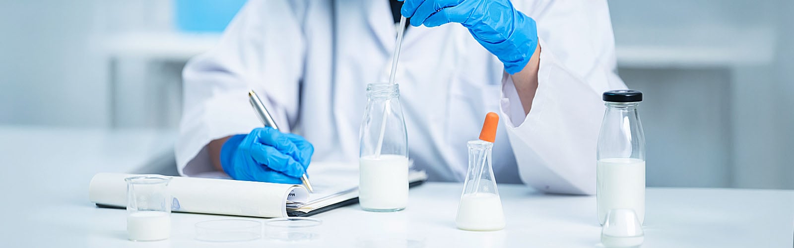 Laboratory Scientist Performing Chemical Composition Analysis on Milk