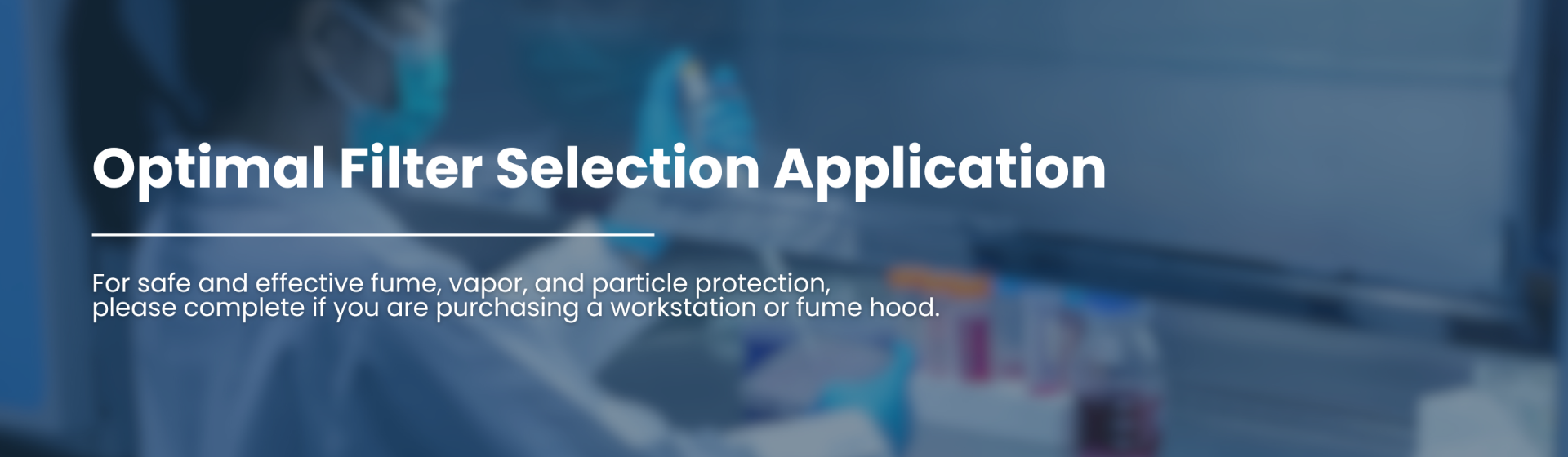 Lab Tech holding glassware under hood